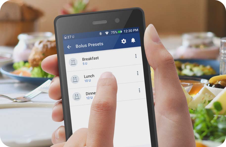 Person using a PDM for Omnipod DASH setting their Bolus Preset for meal time