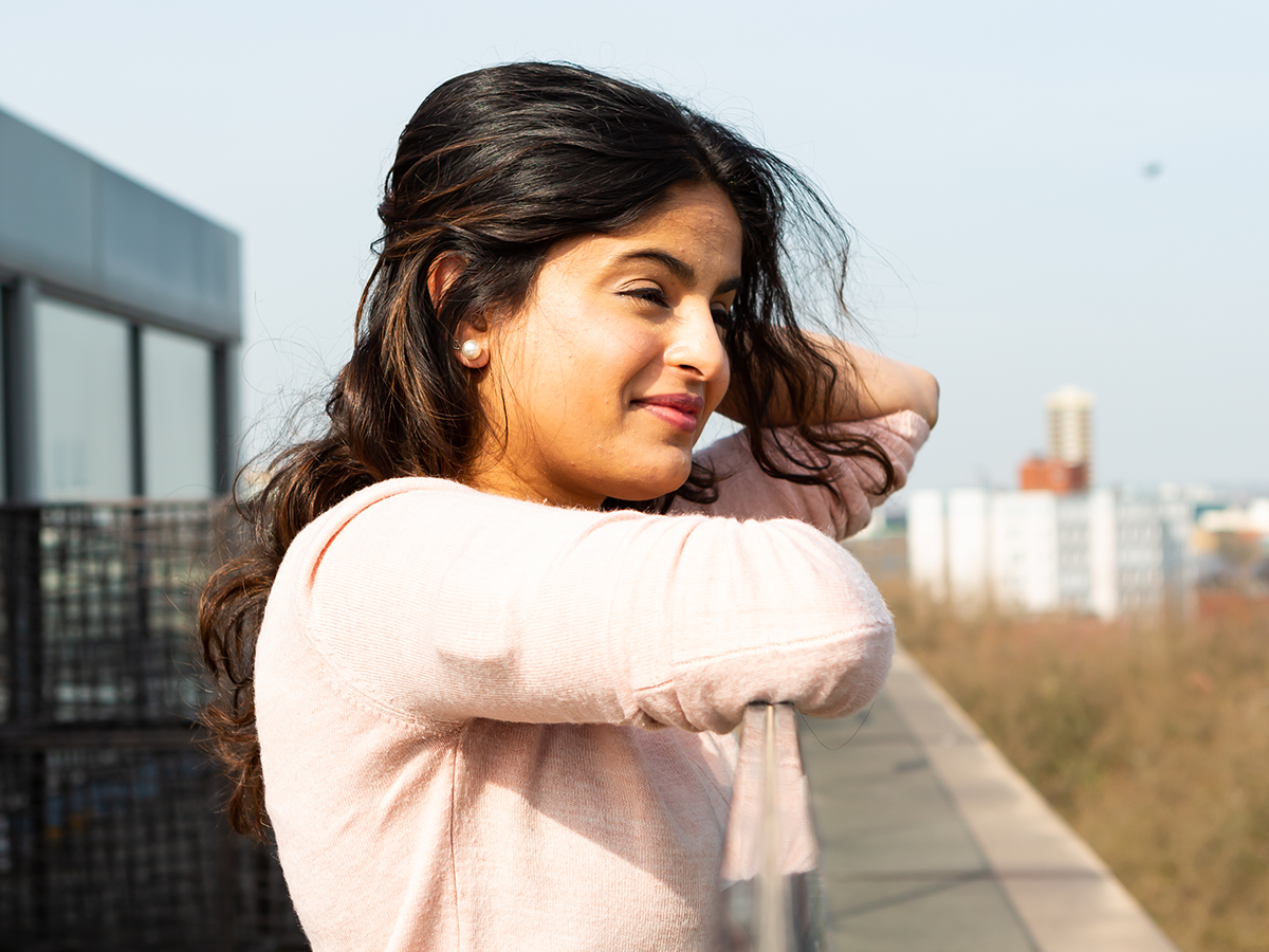 Omnipod Podder Dhruti standing on a rooftop