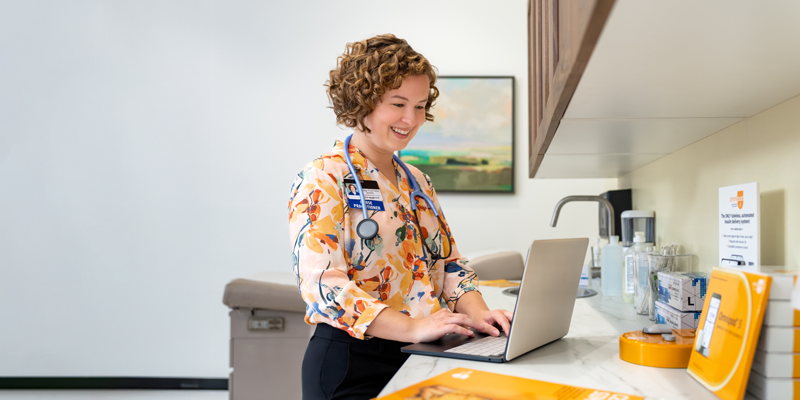 Nurse practitioner with laptop