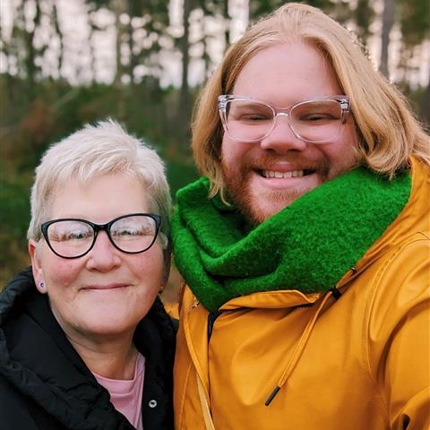 Grace smiling with their mom